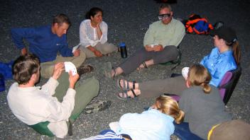 people playing a spades game