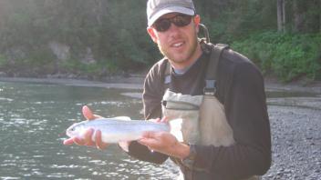 Carson holding a fish
