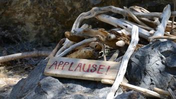 sign that says Applause