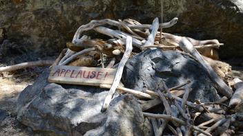 sign that says Applause
