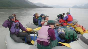 group of people on raft