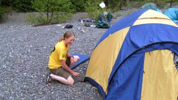 Kate is putting up her tent like a professional