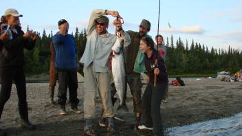 person holding fish