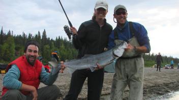 person holding fish