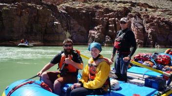 people in rafts