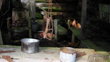 Old hunting traps and furniture of a telegraph cabin