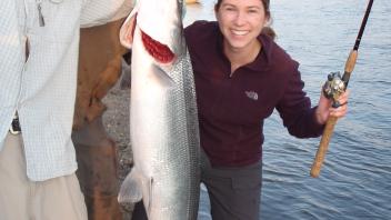 person holding fish