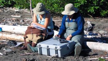 Rebecca and Shruti inputting data into the wonderful PDA