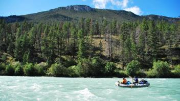 River rafting on teal blue water
