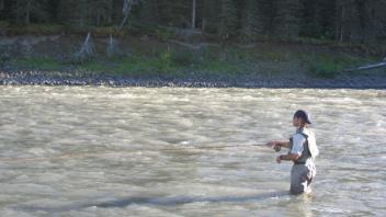 Ryan casting his fly rod