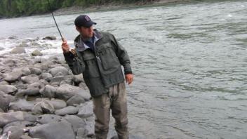 Ryan is fighting a 20 lb catch of rock