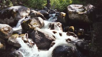 Small waterfalls and smooth rocks.