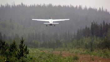The Cessna airplane taking off back to Smithers