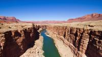 grand canyon with small river in middle